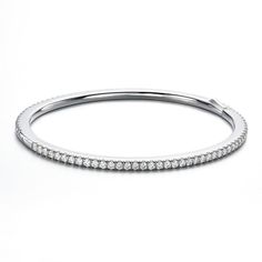 PRICES MAY VARY. This moissanite bracelet length is 7 inches features 2.0mm D color VVS1 clarity moissanite, total moisssanite 3.0cttw. Bracelet thickness: 4mm, width: 2.7mm Sterling Silver Bracelet: White gold plated sterling silver, use the advanced nano plating technology,3-layer protecting, high polished finish, no easy to fade. It has ideal hardness, brightness and luster, hypoallergenic, safe for sensitive skin. Moissanite diamond bracelets is lab created, each moissanite 100% pass the dia Sterling Silver Tennis Bracelet, Stackable White Gold Bangle With Cubic Zirconia, Stackable White Gold Cubic Zirconia Bracelets, Jubilee Bracelet In Moissanite, Jubilee Moissanite Bracelets, Silver Diamond Stackable Bracelet, Silver Moissanite Bangle Diamond Bracelet, Silver Moissanite Bangle Bracelet, Stackable Silver Diamond Bracelet