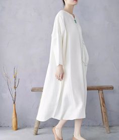 White Linen Pullover Dress Experience the comfort & style with Step into sophistication with our exquisite pullover dress crafted from high-quality linen fabric. Key Features: Style: Pullover Sleeve Length: Long Sleeves Collar Type: Round Neck Length: Medium Long (65cm < length ≤ 80cm) Fit: H Type Popular Elements: Casual Color: White Size: One Size Fits Most Measurements: Chest: 168cm/66" Shoulder Width: 85cm/33" Sleeve Length: 28cm/11" Length: 120cm/47" Elevate your style effortlessly with thi Ramie Long Sleeve Lagenlook Dress, White Cotton Midi Dress For Fall, Lagenlook Linen Dress With Long Sleeves, White Long Sleeve Dress With Pockets, Oversized White Dress With Pockets, Oversized White Linen Casual Dress, Casual Oversized White Linen Dress, Oversized White Midi Dress For Spring, White Linen Spring Dress With Pockets