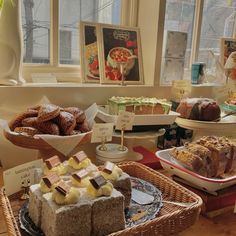 various desserts and pastries on display in baskets