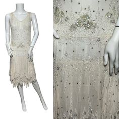 A truly spectacular 1920s flapper dress made from a magnolia (hint of pink) cream silk crepe mousseline fabric that has been beaded, sequinned ajd studded with paste.  As is most often the case this is sleeveless and it has the most spectacular tiered vandyke hem.  This is in amazingly strong and clean condition. it would be fantastic as a wedding dress or party dress and will withstand wear. of course this is an antique item so treat t with due care and respect, but the fabric isn't fragile.  I 1920s Sequin Dresses For Vintage Events, Gatsby Style Embellished Dress For Vintage Events, Art Deco Embellished Sleeveless Dress, Embellished Flapper Wedding Dress, Sleeveless Art Deco Embellished Dress, Summer Gatsby Style Flapper Dress For Wedding, Summer Wedding Gatsby Style Flapper Dress, 1920s Embellished Flapper Dress For Wedding, 1920s Embellished Evening Dresses