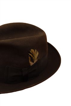 Classic and timeless! This gorgeous vintage chocolate brown suede hat from the 50s is perfect for your commute, Don Draper. The black hat band holds a vintage feather for a little flare! Sized as "extra long oval". Union Made. Product Measurement Details: Length: 11" Width: 10" Height: 5" Brim: 2" Head Length: 8" Head Width: 6.5" Damage to consider: See images in carousel of any damage. Condition: A See the Condition Grade Scale on the photo carousel. Care: Suede brush and professional cleaning. Beaver Hat, Vintage Feather, Vintage Chocolate, Suede Hat, Don Draper, Shop Icon, Union Made, The 50s, Black Hat