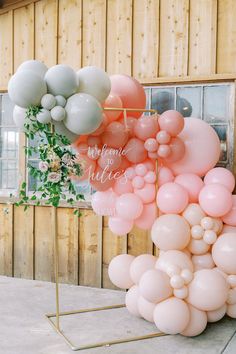 balloons are arranged in the shape of an arrow