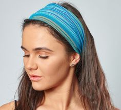 Unisex Blue & Green Striped Nepalese Cotton Headband by Antonia York D E S C R I P T I O N Our wide, easy to wear, unisex 'Ziggy' striped cotton bandana is a very versatile accessory; great for everyday wear, active-wear, and the beach. Please Note: The bandana is made from a woven cotton fabric with no stretch. If you prefer a more loose/relaxed fit you may want to try one of our jersey bandanas instead. Jersey is a knitted fabric with stretch. Content: 100% cotton Handmade by female artisans i Casual Summer Headband With Elastic Band, Adjustable Blue Headband For Spring, Blue Headband For Summer Beach, Blue Summer Headband For Beach, Blue Summer Beach Headband, Casual Blue Headband For Spring, Fitted Blue Headband For Summer, Stretch Bandeau Headband For Summer, Blue Casual Headband