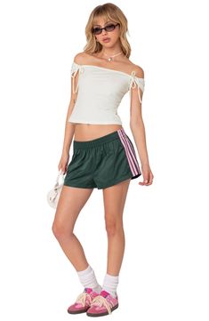 Build your best athleisure looks yet with these swishy, lightweight shorts cut from pure nylon and detailed with sporty stripes at the sides. Elastic waist 100% nylon Machine wash, dry flat Imported Elevated Workout Outfit, Sporty Spring Activewear With Side Stripes, Spring Sportswear Bottoms With Side Stripes, Sporty Stretch Bottoms With Three Stripes, Summer Athleisure Athletic Shorts For Streetwear, Summer Sportswear Bottoms With Three Stripes, Summer Streetwear Athleisure Athletic Shorts, Summer Sportswear Streetwear Shorts, Activewear With Elastic Side Panels For Spring