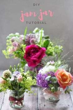 three vases with different colored flowers in them