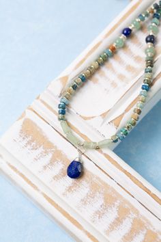 Indulge in the beauty of the sea with our Pacifica Collection! Each piece is meticulously handcrafted with stunning shades of blue, capturing the essence of ocean waves and clear skies. Sterling Silver (Lead & Nickel Free) Aquamarine, Jasper, Apatite, Lapis Lazuli 14.5-16.5" adjustable with sterling silver lobster claw clasp We hand select our natural materials, thus there may be slight variations in color and/or size that will not detract from the overall aesthetic. Our unique handcrafted desig Blue Kyanite Gemstone Beaded Necklace, Blue Kyanite Gemstone Bead Necklaces, Adjustable Blue Aquamarine Jewelry, Blue Lapis Lazuli Beaded Gemstone Necklace, Blue Lapis Lazuli Beaded Gemstone Necklaces, Blue Kyanite Gemstone Necklace, Blue Kyanite Gemstone Beads Jewelry, Blue Kyanite Round Bead Jewelry, Blue Kyanite Jewelry With Gemstone Beads