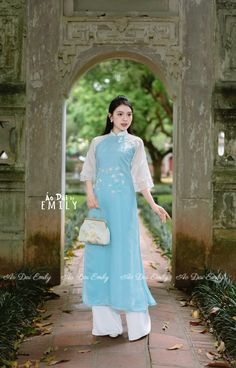 🌻Material: Voan Tơ Stretchy level: 0/10 🌻 The measurement of this ao dai (long dress) is in Vietnamese size (American size tends to be bigger for the same size). Please LOOK AT THE SIZE CHART CAREFULLY BEFORE ORDERING. There might have some chalk writings on the fabric due to making process. These marks can be washed away easily. 🌻🌻No returns or exchanges Buyer can contact seller about any issues with an order. 🌸 Follow us Facebook/aodaiemily www.aodaiemily.com 💜 Thank you very much!💜 Elegant Full-length Ao Dai For Summer, Long Blue Ao Dai For Spring, Traditional Fitted Blue Ao Dai, Traditional Blue Fitted Ao Dai, Traditional Summer Ao Dai For Weddings, Traditional Ao Dai For Summer Wedding, Traditional Summer Wedding Ao Dai, Festive Fitted Blue Ao Dai, Elegant Blue Floor-length Ao Dai