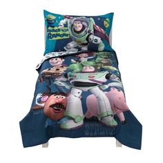 an image of a bed set with toy story characters on the sheets and pillow cases