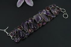 "Handmade Amethyst Bracelet\\amethyst Adjustable Bracelet\\ Gemstone Bracelet\\Amethyst Jewelry\\Vintage bracelets\\Adjustable bracelet Material : Brass Gemstone : Amethyst Color : As Pictured  Metal Polish : Silver Oxidized  Shipping Policy :  Free Shipping Available  Fast Shipping:  Each item is individually packed securely with quality products to help ensure safe and undamaged delivery.  We ship within 1 To 3 business days after payment is received. Delivery is generally within 8-10 days worldwide after shipping. In rare cases it makes take up to 2-3 weeks for delivery depending upon the destinations and customs regulations in your country. All packages have a duly filled custom declaration form in order to avoid and delay in customs. FEEDBACK We strive for 100% Customer Satisfaction a Bohemian Purple Round Crystal Bracelet, Unique Handmade Amethyst Bracelets, Unique Amethyst Bracelet Jewelry, Unique Adjustable Amethyst Bracelets, Unique Amethyst Bracelets With Natural Stones, Unique Amethyst Bracelet, Unique Adjustable Purple Jewelry, Unique Amethyst Gemstone Bracelets, Unique Adjustable Amethyst Jewelry