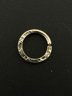 16 GAUGE - SEPTUM RING JEWELRY - select your metal type in the drop down menu - choices are * 14kt rose gold filled, *12kt yellow gold filled, *sterling silver *niobium *argentium sterling - choose your ring size from 6mm to 16mm - OUTSIDE or INSIDE diameter options in drop down menu -16 gauge wire - 1.3mm - for larger holes -NOTE these are strong rings due to the thickness of the wire and their size -the bottom half of the ring is flattened and textured to add dimension and a bit of flash -you Hypoallergenic Metal Hoop Rings, Hypoallergenic Metal Rings, Nickel-free Septum Ring For Wedding, Nickel-free Round Septum Ring For Wedding, Gold Septum Ring For Anniversary, Small Hoop Gold Rings For Anniversary, Gold Small Hoop Rings For Anniversary, Small Hoop Jewelry With Jump Ring For Gifts, Small Hoop White Gold Rings For Gift