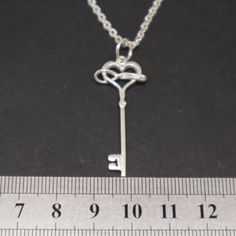 "Polyamory Key Necklace for Women Base Material: 925 Sterling Silver Size: 20mm X 25mm (Approximately) Chain Length: 16'' - 24'' Inches Thickness: 1.5mm Metal Stamped: 925 You'll receive Order Shipped Email from us when your item is completed and shipped. SPECIAL ANNOUNCEMENT 1. Please visit https://www.etsy.com/shop/yhtanaff for more designs. 2. Subscribe our newsletter to receive a Coupon Code for 10% discount. \"At Our Shop Profile's Announcement Section\" 3. Please LIKE our Facebook Fan Page Nickel Free Jewelry For Anniversary On Valentine's Day, Symbolic Jewelry For Valentine's Day Anniversary, Symbolic Engraved Jewelry For Valentine's Day, Valentine's Day Symbolic Engraved Jewelry, Sterling Silver Infinity Necklace For Valentine's Day, Symbolic Personalized Jewelry For Valentine's Day, Elegant Nickel-free Necklace For Valentine's Day, Personalized Symbolic Jewelry For Valentine's Day, Symbolic Jewelry For Anniversary On Mother's Day