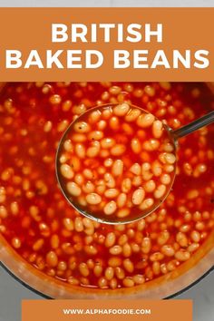 a spoon full of baked beans in a pot with the words british baked beans above it