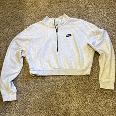 Never Worn. Excellent Condition. Nike Gray Tops For Fall, Nike Half-zip Winter Top, Nike Winter Half-zip Top, Casual Half-zip Sweater For Spring, Nike Half-zip Top For Fall, Casual Half-zip Sports Tops, Nike Casual Spring Sweater, Spring Streetwear Half-zip Top, Tops Nike