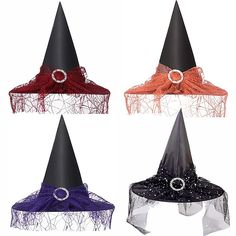 four witches hats with ribbons on them, one is black and the other has red