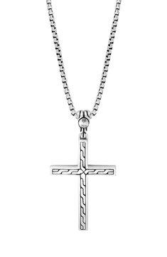 A meaningful keepsake for a loved one or a sentimental personal keepsake, this handcrafted sterling-silver necklace is anchored with a deeply symbolic cross pendant. 20" length; 3/4"W x 1 1/2" pendant Lobster clasp closure Imported Sterling silver Imported Classic Engraved Sterling Silver Cross Necklace, Classic Sterling Silver Engraved Cross Necklace, Sterling Silver Crucifix Necklace With Box Chain, Sterling Silver Cross Pendant Necklace With Polished Finish, Sterling Silver Necklace With Cross Pendant And Polished Finish, Sterling Silver Necklace With Oxidized Cross Pendant, Oxidized Sterling Silver Cross Pendant Necklace, Silver Cross Necklace With Box Chain, Sterling Silver Cross Pendant Jewelry