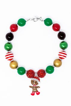 Add some bling to your little one's get-up with this Gingerbread Man Bubblegum Necklace. This necklace comes with a gingerbread man pendant and fun Christmas colored beads. So have her looking like the diva she is whenever she steps out this holiday season. Please note: We check all necklaces before being shipped out to insure you do not receive damaged items. As such, we will not be sending out replacements or refunding necklaces. Necklaces can be fragile if handled improperly. Actual product m Donut Dress, Kids Jewelry Box, Sparkle In Pink, Bubblegum Necklace, Christmas Necklace, Birthday Girl Dress, Tiny Treasures, Fun Christmas, Rhinestone Bead