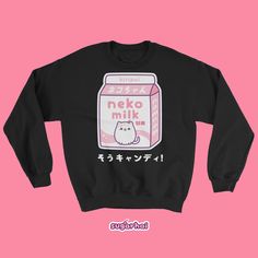 A soft but sturdy sweatshirt with a cute carton of pink kitty cat milk. This sweater looks great on both men and women. Perfect for people who love kawaii clothing and being cozy. Runs large for women, order your regular size for an oversized look, order a size down for a more fitted look. Fits men true to size. Plus sizes available! Pre-shrunk Runs large for women Classic fit Reduced pilling Double-needle stitching throughout Sizing tip: Take a sweatshirt or tee that fits you the way you like, Cute Long Sleeve Sweatshirt With Cat Design, Cute Long Sleeve Sweatshirt With Cat Print, Hello Kitty Cotton Sweatshirt In Kawaii Style, Cute Cotton Sweatshirt With Hello Kitty Print, Cute Hello Kitty Print Crew Neck Sweatshirt, Kawaii Crew Neck Sweater, Kawaii Long Sleeve Top With Cat Design, Cute Long Sleeve Hello Kitty Sweatshirt, Pink Cotton Kawaii Sweater