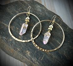 Crystal Hoop earrings, Raw crystal earrings, Angel Aura, natural Quartz, boho hoop, bridal jewelry, earrings, Bohemian earrings, gold hoops ⭐️ Not two crystals will look exactly the same but they are picked out where shape and size are as close as possible. Crystals are soured in their natural form and are not perfect, they may have slight cracks and blemishes and not uniformed.  Please note we only use real crystal Quartz. Colored Quartz are real Quartz which have been dyed. Aura Quartz are rea Gold Bohemian Hoop Crystal Earrings, Bohemian Gold Hoop Crystal Earrings, Bohemian Hammered Hoop Jewelry, Handmade Bohemian Crystal Hoop Earrings, Bohemian 14k Gold Filled Hoop Earrings, Bohemian Wire Wrapped Hoop Crystal Earrings, Bohemian Hammered Hoop Earrings, Raw Crystal Earrings, Quartz Hoop Earrings