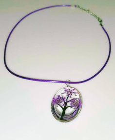 Free Ground Advantage USPS Shipping from California to USA Addresses Dried flower, terrarium necklace with the Tree of Life in 10 colors. In Genesis, In the Garden of Eden, the Tree of Life gave eternal life. The Tree of Life is mentioned outside of Genesis. The term "tree of life" appears in Proverbs (3:18; 11:30; 13:12; 15:4) and Revelation (2:7; 22:2,14,19). The Tree of Life is also described in many non-Christian religions, but it is definitely mentioned in the Old and New Testaments. The ne Flower Terrarium, Purple Names, Dried Flower Necklace, The Garden Of Eden, Terrarium Necklace, Old And New Testament, Garden Of Eden, Tree Of Life Pendant, Anklet Bracelet