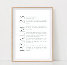 a white framed print with the words pray 23 in black and grey font on it