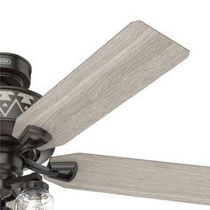 a ceiling fan with two wooden blades and a light on the bottom one is turned off