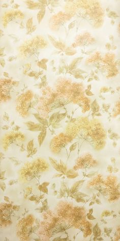 a white and yellow flowered wallpaper with lots of flowers on the bottom half of it