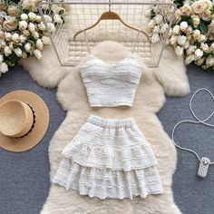 Fitted Feminine Two-piece Set, Feminine Two-piece Party Sets, Fitted Lace Crop Top With Ruffles, Elegant Two-piece Crop Top For Spring, Elegant Two-piece Crop Top For Summer, Sleeveless Lace Sets For Spring, Fitted Lace Sets With Ruffles, Fitted Sleeveless Lace Set, Fitted Lace Summer Sets