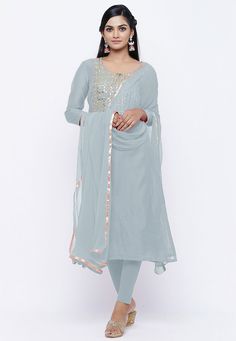 Chanderi Cotton Straight Kameez in Pastel Grey. This Readymade attire with Cotton Lining is Enhanced With Gota Patti, Zari, Bullion And Beads Work And is Crafted in Round Neck And Quarter Sleeve. Available with a Lycra Leggings in Pastel Grey and a Faux Chiffon Dupatta in Pastel Grey, For sizes 46 to 66, a Shantoon Churidar will be available instead of Leggings in the same color. The Kameez and Bottom Lengths are 45 and 45 inches respectively. Do Note: Accessories shown in the image are for pres Fitted Embellished Salwar Kameez With Straight Kurta, Embellished Chanderi Churidar Straight Kurta, Embellished Georgette Unstitched Suit, Embellished Semi-stitched Chanderi Suit, Embellished Anarkali Unstitched Suit With Straight Kurta, Fitted Anarkali Unstitched Suit Embellished, Embellished Fitted Unstitched Georgette Suit, Embellished Fitted Anarkali Unstitched Suit, Embellished Fitted Churidar For Designer Wear