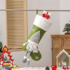 a christmas stocking hanging from a clothes line