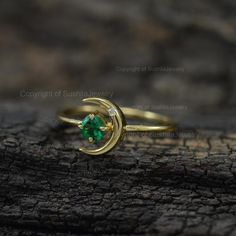 Zambia Emerald Gemstone Diamond Ring / Crescent Moon Dainty Cuff Ring / 14k Solid Gold Minimalist Emerald Ring / Stacking Ring / Handmade Jewelry / Wedding Ring / Birthstone of May.≫ Features• Item Code : SGR01306• Diamond: 100% Genuine Diamond• Diamond Wt: 0.015 ct• Diamond Color: G-H• Diamond Clarity: S2-SI1• Diamonds Cut: Brilliant Cut (Excellent Cut)• Emerald Gemstone wt  : 0.15 ct• Metal: 14K Solid Gold (18K also available - Additional fees may apply)• More option in gold color: Rose gold, 14k Gold Crescent Jewelry For Promise Ring, 14k Gold Crescent Promise Ring, Fine Jewelry Crescent-shaped Promise Ring, Fine Jewelry Crescent Shaped Promise Ring, Fine Jewelry Crescent Promise Ring, Yellow Gold Crescent Rings For Promise, Gold Emerald Stackable Rings For Wedding, Gold Emerald Stackable Wedding Rings, Adjustable Stackable Rings For Wedding, May Birthstone