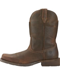 Ariat Rambler Cowboy Boots - Square Toe | Sheplers Rugged Work Boots For Western-themed Events, Rugged Waterproof Boots With Steel Toe, Rugged Moc Toe Sturdy Boots, Rustic Boots With Reinforced Moc Toe, Rustic Moc Toe Boots With Reinforced Toe, Rugged Leather Waterproof Boots, Western Waterproof Boots With Snip Toe And Impact Resistance, Western Snip Toe Waterproof Boots, Impact Resistant, Rugged Work Boots With Reinforced Toe