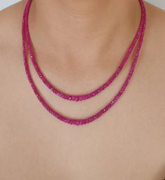 Exquisite handcrafted beaded necklace features two strands of natural Ruby gemstone beads.  Beads are graduated in size ranging from 2 mm to 6.8 mm in width.   This elegant necklace is finished with an 18K White Gold S-hook clasp. Rubies Total 131 Carat Necklace Length:  Shortest strand 45 cm (17.7 inches); longest strand 51.5 cm (20.3 inches) Gold Clasp 15 mm x 10 mm; thickness 2 mm One of a kind.  Made in Greece. All items are delivered ready for gift-giving.  Please don't hesitate to contact Double Strand Polished Beads As Gift, Double Strand Faceted Beads Necklace As Gift, Polished Double Strand Beads As Gift, Faceted Double Strand Beads As Gift, Faceted Double Strand Beads For Gift, Double Strand Gemstone Beads Gift, Faceted Double Strand Beaded Necklace As Gift, Double Strand Gemstone Beads For Jewelry Making, Classic Red Gemstone Beads Necklace