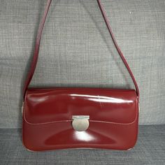 Gently Used With A Few Scuffs That Are Not Very Noticeable. Size In Pictures, Clean Interior With Zipper And A Smaller Side Pocket. Fits An Iphone 15 Pro Max With Well With Extra Room. Color It An Ox Blood Red. Salvatore Ferragamo Bags, Vintage Shoulder Bag, Room Color, Blood Red, Extra Room, Side Pocket, Iphone 15 Pro, Ox, Salvatore Ferragamo