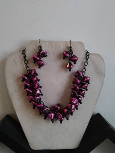 I have always loved novelty vintage jewelry ! This is my version , made by me of the statement jewelry that was so poplular in the late 40s early 50s & the colors are perfect compliment 😊 Fuschia pink and black faceted lucite beads in double rows with black aluminum chain that is 20 inches long. Matching earrings are pierced Black Retro Handmade Jewelry, Retro Black Handmade Jewelry, Retro Purple Jewelry For Gifts, Pink Costume Jewelry For Party, Retro Dangle Jewelry For Party, Adjustable Pink Jewelry Set For Party, Handmade Costume Jewelry Earrings For Party, Purple Vintage Jewelry For Party, Handmade Dangle Jewelry Sets For Party