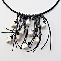 Leather & Pearl Necklace - Large cultured, fresh water, baroque pearls are hand knotted with leather on a heavy leather cord. The leather fringe falls six inches at its longest point. <br><br>Finished with a magnetic clasp. Pearl Fringe, Fiber Necklace, Leather Pearl Necklace, Edgy Jewelry, Knotted Necklace, Leather Jewellery, Leather Scraps, Hippy Chic, Fringe Necklace