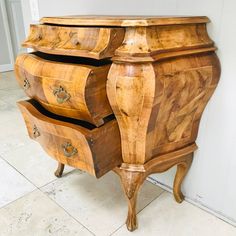 an old wooden dresser with three drawers