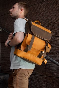 Functionality meets style with leather backpack for men. Whether you're a seasoned traveler or a professional on the go, the thoughtfully designed compartments and features make it the ideal companion. From the office to the outdoors, this backpack effortlessly adapts to your lifestyle, accommodating everything you need. For those who appreciate the heritage of the classic knapsack, leather rendition pays homage to tradition while embracing modern innovation. The knapsack design remains relevant Handmade Backpack, Handmade Leather Backpack, Beautiful Backpacks, Leather Backpack For Men, Handmade Backpacks, Leather Rucksack, Custom Laptop, Laptop Rucksack, Leather Laptop Bag