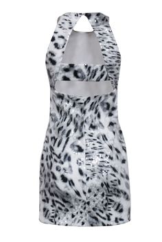 Get wild and sparkly in this Parker sequin grey and white leopard print dress. With a high neck and cut out back detail, this sleeveless dress is perfect for a girls' night out in Vegas or a bachelorette party in Miami. Style it with strappy heels for a fun and fearless look. Size M Shell 95% Polyester, 5% Spandex Lining 97% Polyester, 3% Spandex Invisible side zipper Cut out back details Sleeveless High neckline Bust 34" Waist 28" Shoulder to hem 34" Summer Stretch Mini Dress With Contrast Sequin, Stretch Mini Dress With Contrast Sequin For Summer, Summer Stretch Sequin Dress With Contrast Sequin, Summer Stretch Sequin Dress, Summer Party Mini Dress With Keyhole Back, Fitted Mini Dress With Contrast Sequin For Spring, Fitted Contrast Sequin Mini Dress For Spring, Spring Party Dress With Keyhole Back, Summer Party Leopard Print Dress