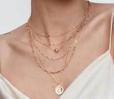 14k gold filled. Made to live in, made to last. Adjustable from 14.5 inches to 16.5 inches. Dainty chain with an 8mm round gold charm. Elegant 14k Gold-filled Coin Necklace, Gold Dainty Coin Necklace For Layering, Dainty Gold Coin Necklace For Layering, Gold Tarnish-resistant 14k Gold-filled Coin Necklace, Tarnish Resistant 14k Gold Filled Coin Necklace, Dainty Gold Chain Round Charm Necklace, Everyday 14k Gold-filled Coin Necklace, Everyday 14k Gold Filled Coin Necklace, 14k Gold Filled Round Charm Necklace