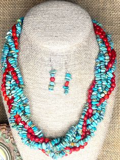 This Southwestern necklace and earrings for women is made up of red Coral and Genuine Natural Turquoise chip beads.  It is a stunning and classic  6 strand jewelry set.  The color combination is striking. This beautiful classic necklace is perfect for that natural, casual, boho look. It will make a great gift for a friend who loves beaded jewelry. It is handmade ending up in a silver toggle to create this feminine necklace. This necklace is 20" long and comes with matching earrings. This is a ge Southwestern Style Red Jewelry For Gifts, Red Southwestern Style Jewelry Gift, Southwestern Style Red Jewelry For Gift, Southwestern Multi-strand Jewelry With Colorful Beads, Southwestern Multi-strand Colorful Beads Jewelry, Southwestern Red Gemstone Jewelry, Southwestern Style Red Gemstone Jewelry, Artisan Dangle Jewelry With Polished Beads, Southwestern Adjustable Jewelry With Colorful Beads