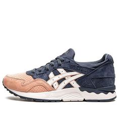 Introducing the Kith x ASICS Gel Lyte 5 'Salmon Toe' - a sneaker that was initially made available to participants of Ronnie Fieg's Zoom panel in November 2021. This special edition sneaker comes in a navy and pink color scheme, featuring a pigskin suede upper with a perforated toe box and white synthetic leather side stripes. 'KXTH' is embossed on the heel overlay, while mismatched ASICS and Fieg branding is embroidered on each tongue. A white EVA midsole packs Gel cushioning in the heel for a Asics Sneakers With Rubber Waffle Outsoles For Light Sports, Casual Asics Running Shoes With Rubber Waffle Outsoles, Asics Running Shoes With White Rubber Sole, Asics Pink Running Shoes With Boost Midsole, Asics High-top Sneakers For Light Sports, Sporty Asics Sneakers With Rubber Sole, Asics Sneakers For Light Sports, Asics Sporty Sneakers For Light Sports, Asics Sneakers With Boost Midsole For Light Sports