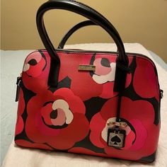 This Pretty Leather Kate Spade Handbag Will Be A Great Addition To Your Closet! Bright Pretty Pinks/Reds Make It Very Graphic: Imagine It With Your Favorite Lbd! There Are No Feet On The Bottom Of The Bag But The Interior Is Spotless (Virtually Unused). Extra Cute Hanging Tag Makes The Purse Really Special! Pink Floral Print Leather Bag, Chic Formal Bags With Floral Print, Chic Formal Bag With Floral Print, Elegant Kate Spade Bags With Floral Print, Elegant Kate Spade Floral Print Bags, Kate Spade Travel Bag With Floral Print, Kate Spade Floral Print Travel Bag, Chic Kate Spade Bags With Floral Print, Elegant Red Bags With Floral Print