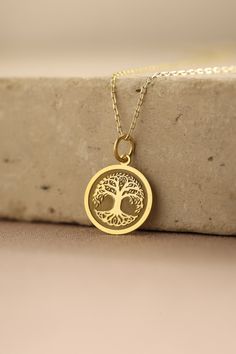 Gold Tree of Life Pendant - Tree of Life Gold Necklace ● Material of pendant: Solid Gold 14k ( REAL GOLD ) ● Metal Stamp: 14k ( REAL GOLD ) ● The pendant is available in 5 sizes: - 12,7 mm / 0.5 inches (Diameter) - 14,0 mm / 0,55 inches ( Diameter ) In the photos - 15,3 mm / 0.6 inches ( Diameter ) - 16,5 mm / 0,65 inches ( Diameter ) - 19,1 mm / 0,75 inches ( Diameter ) ( In the photos the size is 14mm / 0.55 inches Diameter ) ( Jump Ring inner diameter: 4 mm ) ● Material of chain: Solid gold 1 Symbolic Gold Jewelry With Tree Of Life, Gold Nickel-free Necklace For Memorial, Tree Of Life Pendant Necklace As Gift, Tree Of Life Pendant Necklaces For Anniversary, Tree Of Life Round Pendant Jewelry Gift, Tree Of Life Necklace For Gift, Tree Of Life Jewelry Gift, Tree Of Life Round Pendant Jewelry For Anniversary, Gold Tree Of Life