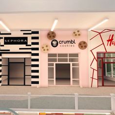 the interior of a crumbl cookies store with black and white stripes on the wall