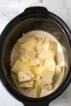 the food in the crock pot is ready to be cooked