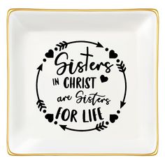 a white and gold plate with the words sisters in christ are sisters for life