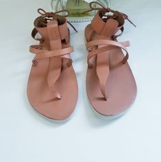 Free People Vacation Day Wrap Sandal Leather In Natural Color (Brown/Tan) Brand New Without Box Small Mark On Top Of Label "People" As Pictured Size Eu 40/ Us 10 Bundle With Other Items In My Closet For The Best Deal Smoke-Free/Pet-Free Home Leather Ankle Strap Flip Flops For Beach, Brown Leather Summer Lace-up Sandals, Brown Leather Lace-up Summer Sandals, Summer Leather T-strap Sandals With Flat Heel, Summer Leather Lace-up Sandals With Ankle Strap, Leather Summer Lace-up Sandals With Ankle Strap, Leather T-strap Sandals With Flat Heel For Summer, Leather Flat Heel Barefoot Sandals For Beach, Leather Flat Heel T-strap Summer Sandals