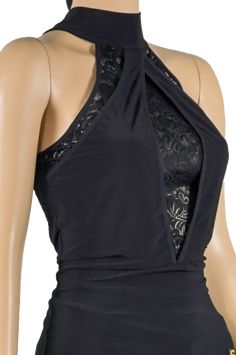 A stretch-knit blouse Halter-neckline Sleeveless cut Centered crossed fish-eye keyhole Lace inserts Club Halter Top With Built-in Bra, Stretch Halter Top With Built-in Bra For Party, Elegant Sleeveless Halter Top With Built-in Bra, Flirty Halter Neck Top For Date Night, Elegant Evening Halter Top With Built-in Bra, Stretch Halter Top With Built-in Bra For Club, Chic Black High Neck Halter Top, Sleeveless Stretch Halter Top For Party, Chic Fitted Halter Top For Club