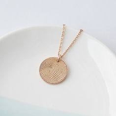 "♥ Disc Fingerprint Necklace ♥ Want to carry a thumprint of your loved one with you always? Get it engraved on our very popular disc fingerprint necklace! * Material: Solid 925 Sterling * Finishing: - Yellow - * Dimensions: Diameter of disc pendant is 1/2 inch (15mm) * Character limits: 1-2 words * Necklace : You can choose up to 24 inches (includes pendant's ) * By default, items comes with BLACK engraving and -plated item comes with CLEAR engraving H O W * T O * O R D E R 1. Please select your Minimalist Etched Jewelry For Keepsake, Thumbprint Jewelry, Handwriting Samples, Fingerprint Necklace, Word Necklace, Fingerprint Jewelry, Disc Pendant, Memorial Jewelry, Beautiful Gift Boxes