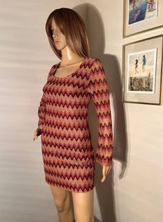 "Vintage 70s bell sleeve chevron dress. Best fits XS/S. Tight on the hips and booty. Very flattering. Waist 14\" Length 24\" Shoulder to shoulder 13.5\" Pit to pit 16.5\" Dress is stretchy For reference, mannequin measurements are as follows: Height: 69\" (5'9\") Chest: 32\" Waist: 24\" Hip: 34\"" Retro Long Sleeve Dress For Night Out, Fitted Multicolor Bodycon Dress For Fall, Retro Long Sleeve Mini Dress For Fall, Fall Retro Long Sleeve Mini Dress, Multicolor Stretch Bodycon Dress For Fall, Retro Long Sleeve Stretch Dress, Retro Stretch Dresses For Fall, Retro Fitted Mini Dress For Fall, Fitted Retro Mini Dress For Fall